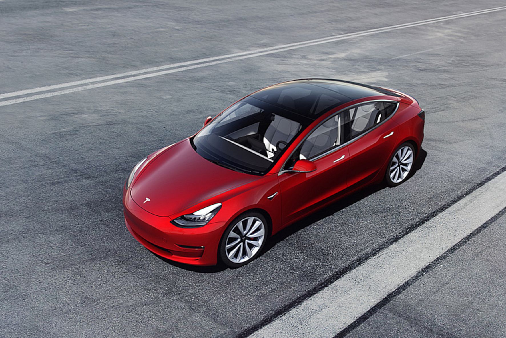 Ein roter Tesla 3. Quelle: TESLA/TRD mobil