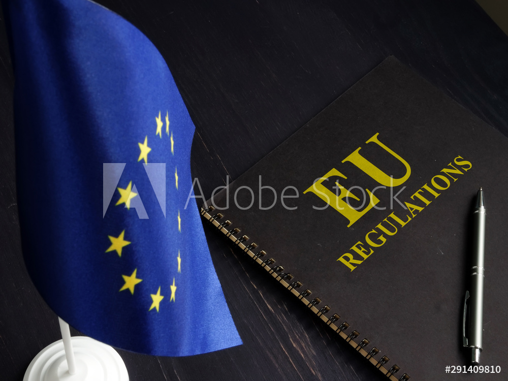 EU regulations and Europe Union flag.